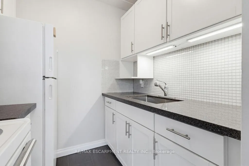 Photo 13 of Unit 404, 107 St. Joseph's Drive, Hamilton, Corktown — HOMEH