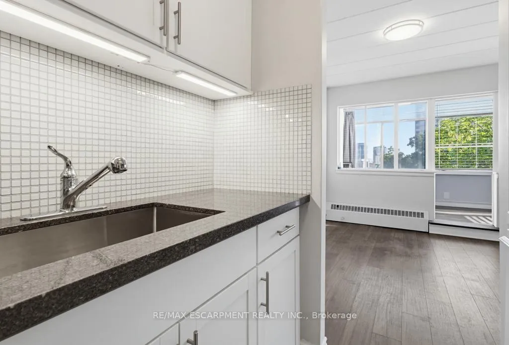Photo 15 of Unit 404, 107 St. Joseph's Drive, Hamilton, Corktown — HOMEH