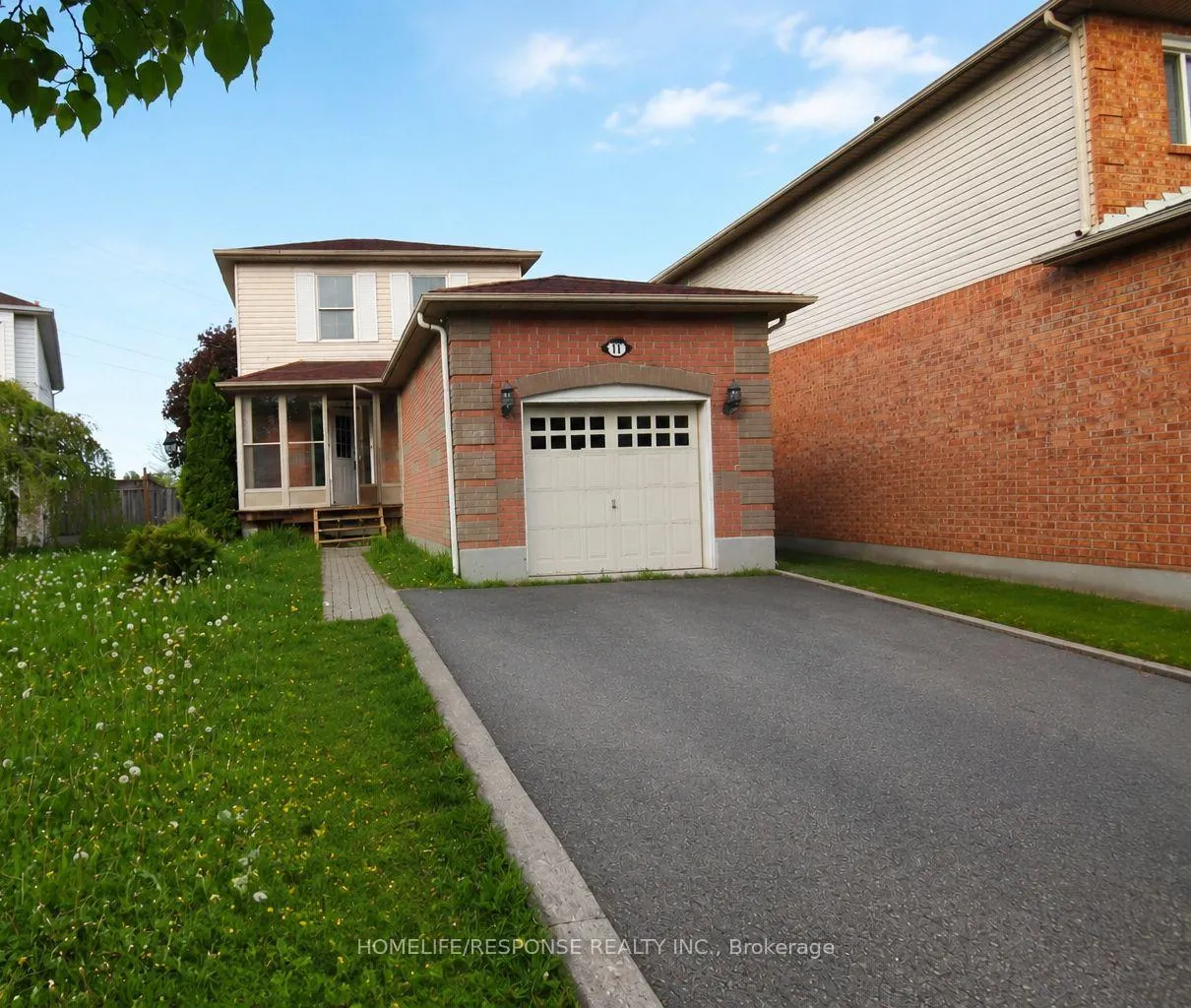 Front of 11 Saddlecreek Court