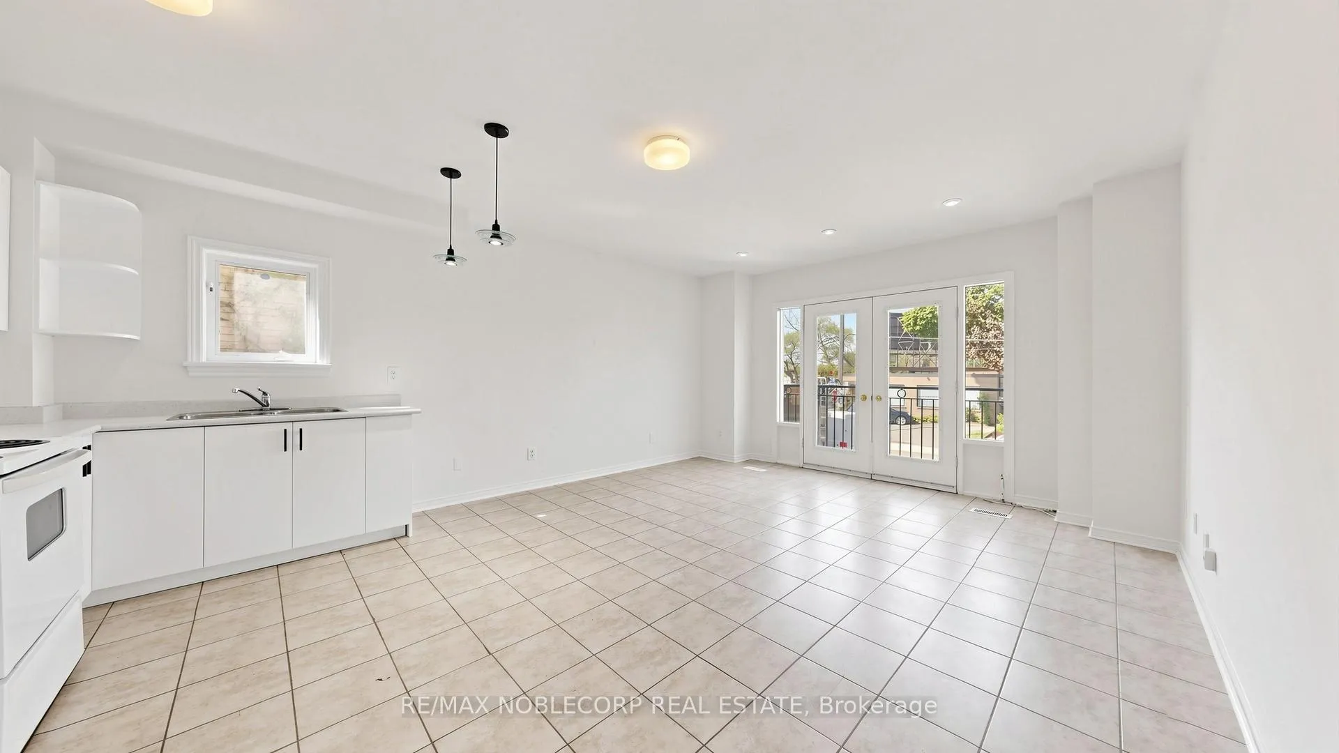 Photo 2 of Unit 1, 67 Florence Crescent, Toronto, Rockcliffe-Smythe — HOMEH