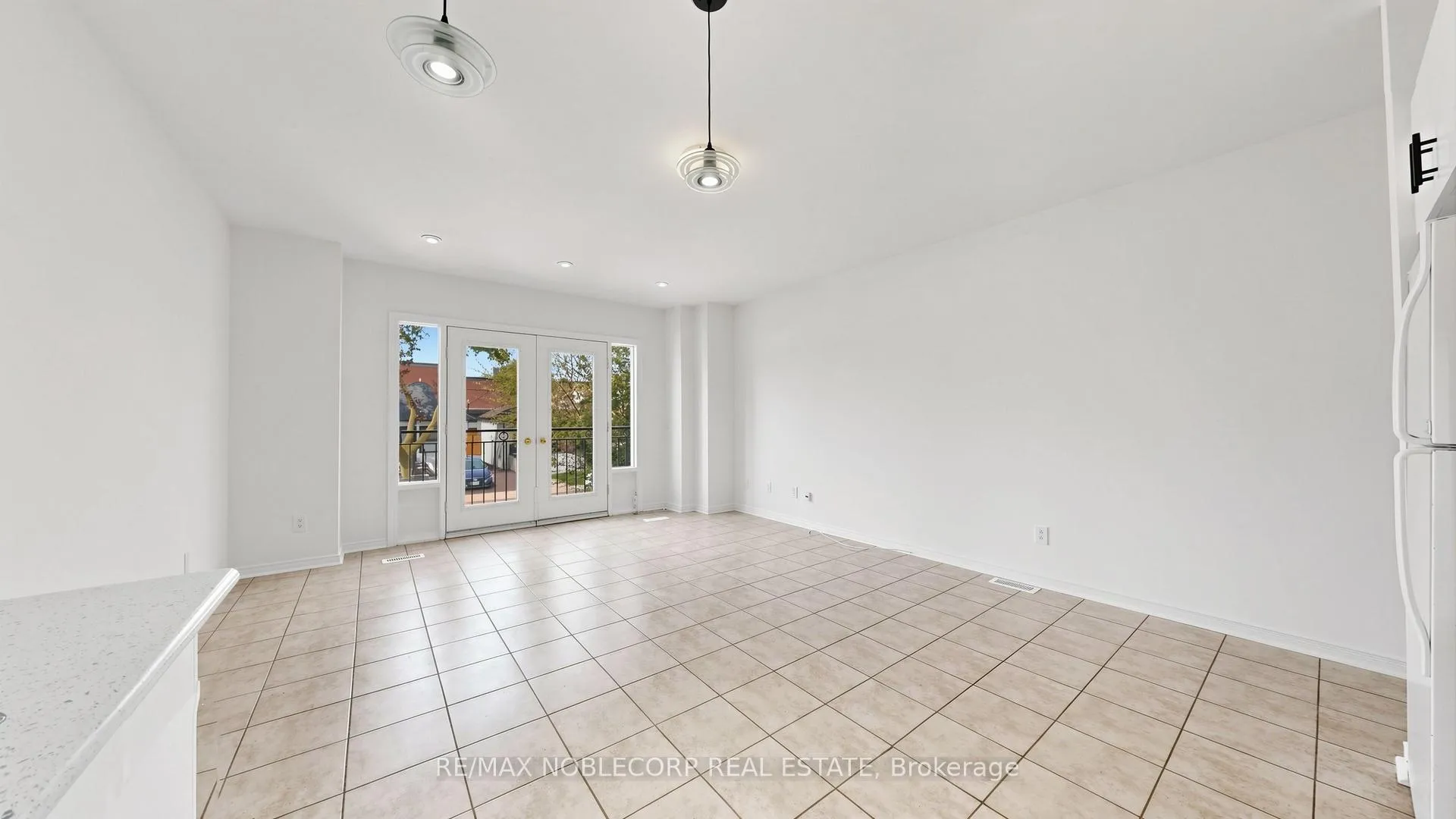 Photo 3 of Unit 1, 67 Florence Crescent, Toronto, Rockcliffe-Smythe — HOMEH