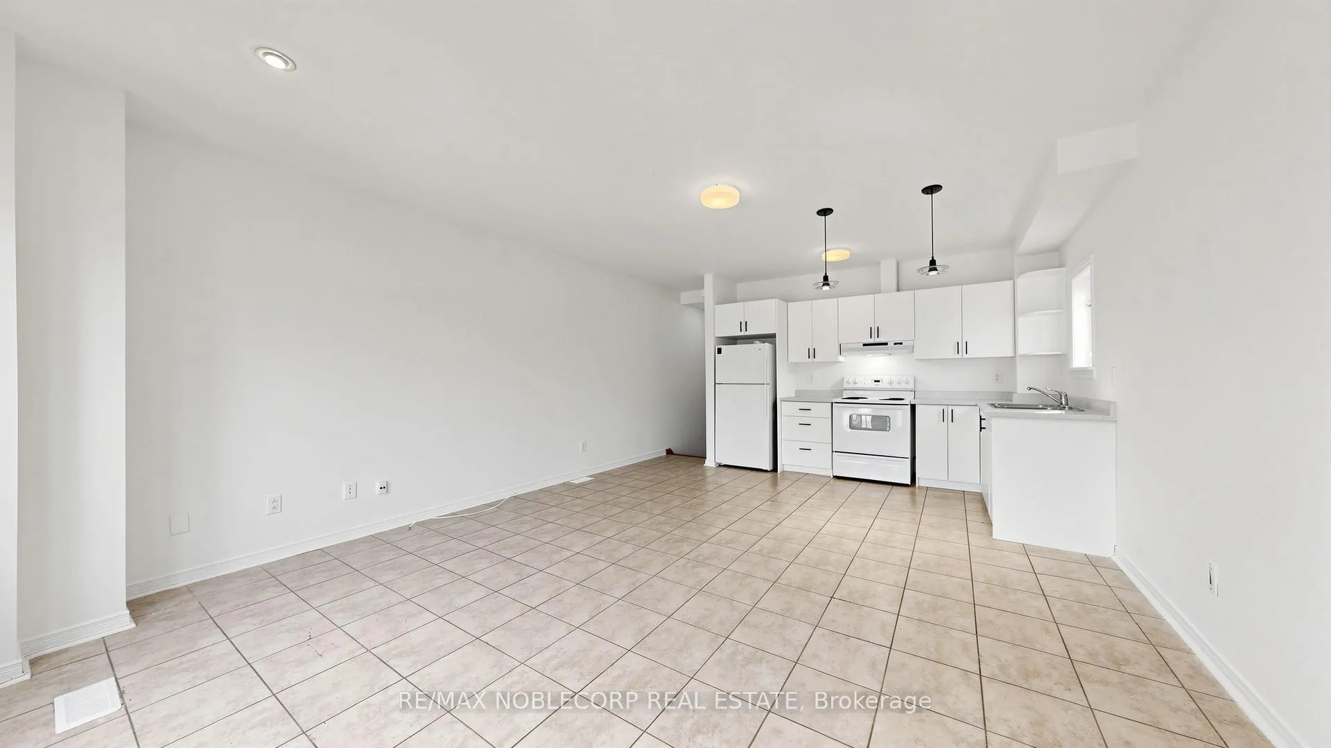 Photo 4 of Unit 1, 67 Florence Crescent, Toronto, Rockcliffe-Smythe — HOMEH
