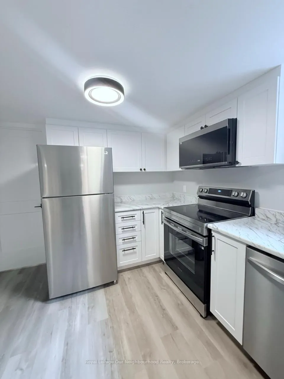 Photo 5 of Unit Lower, 1382 Leighton Road, Peterborough, Northcrest Ward 5 — HOMEH