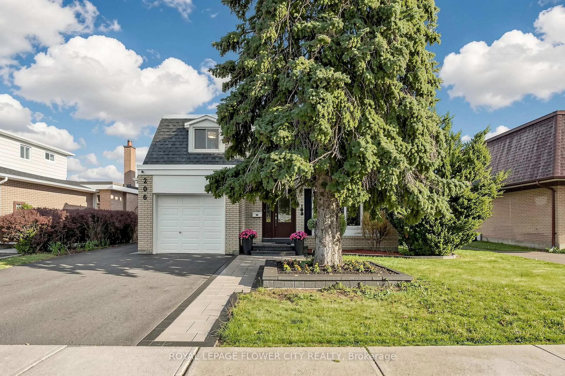 Front of 206 Mcmurchy Avenue S