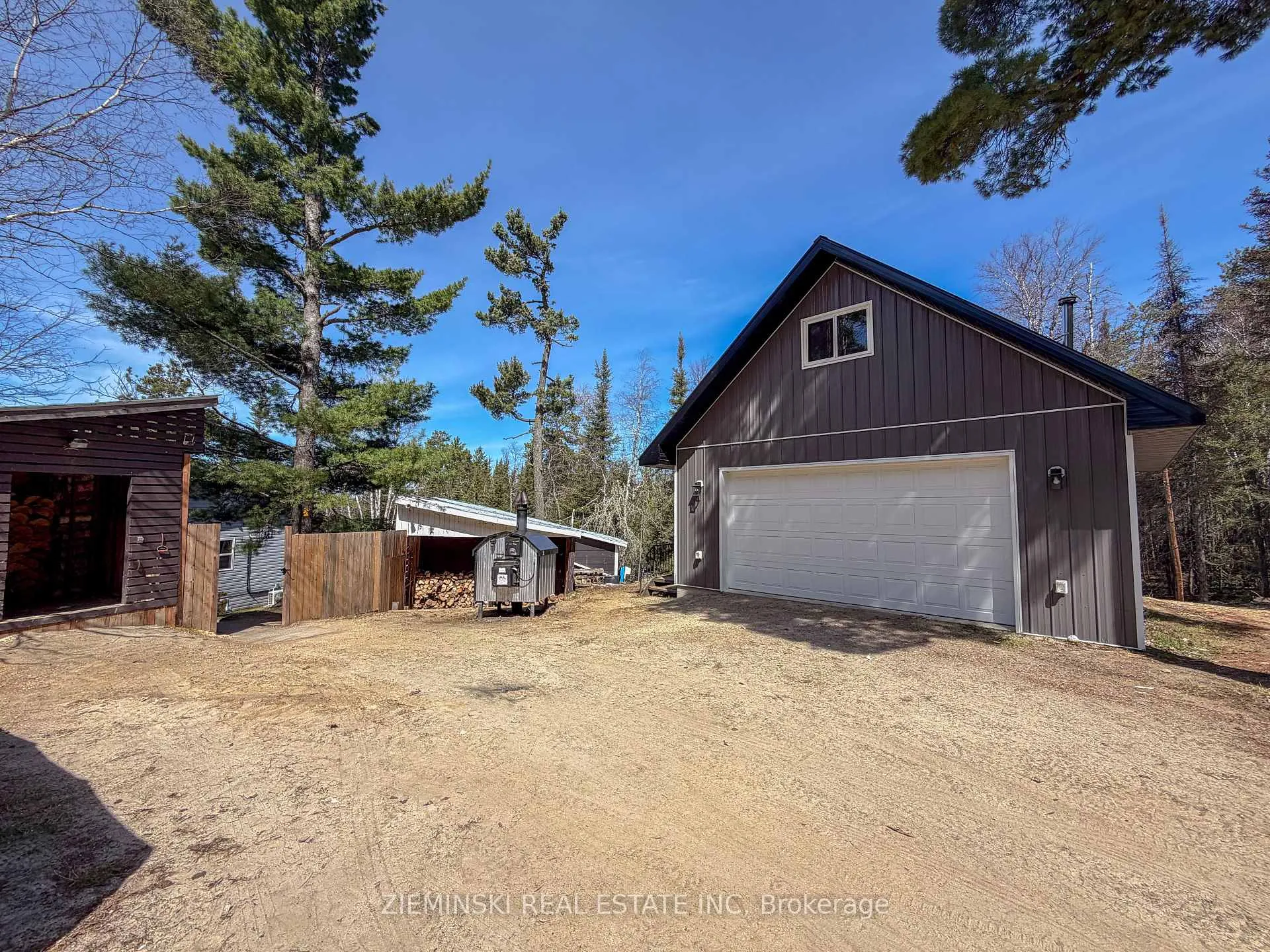 Photo 29 of 435 Esker Road, Timmins, TM - Outside East — HOMEH