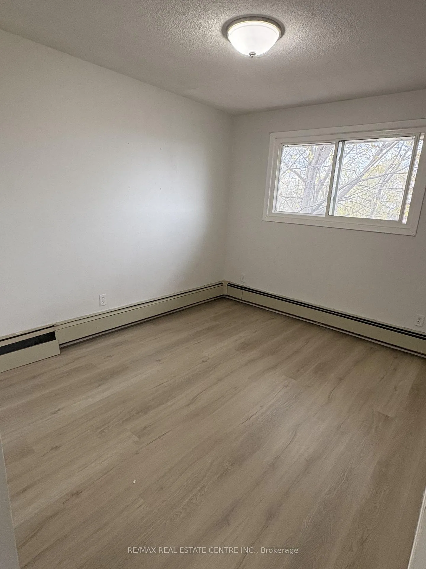 Photo 2 of Unit 1, 103 Sixth Street, Midland — HOMEH