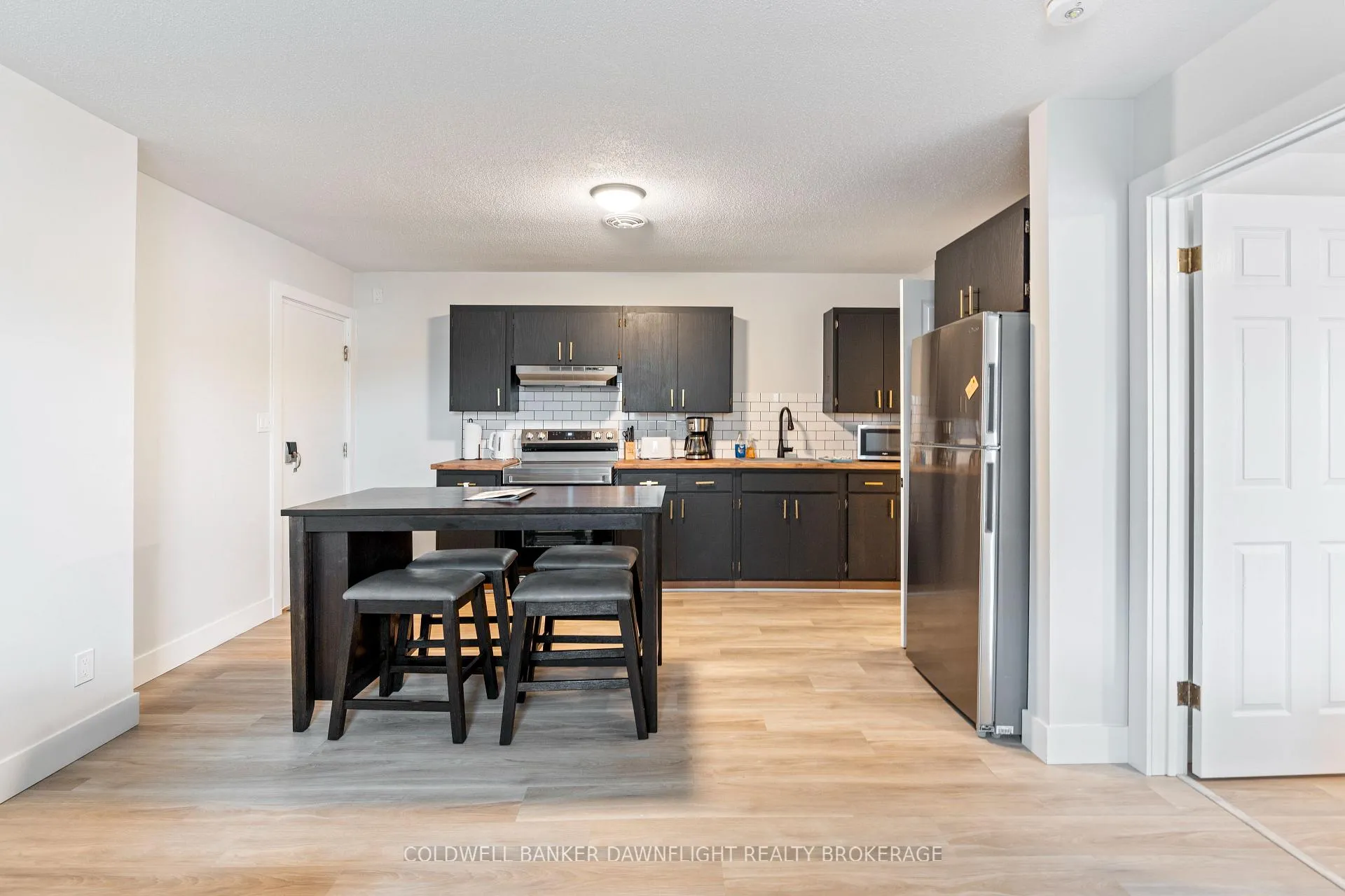 Photo 7 of Unit 4, 383 Main Street S, South Huron, Exeter — HOMEH