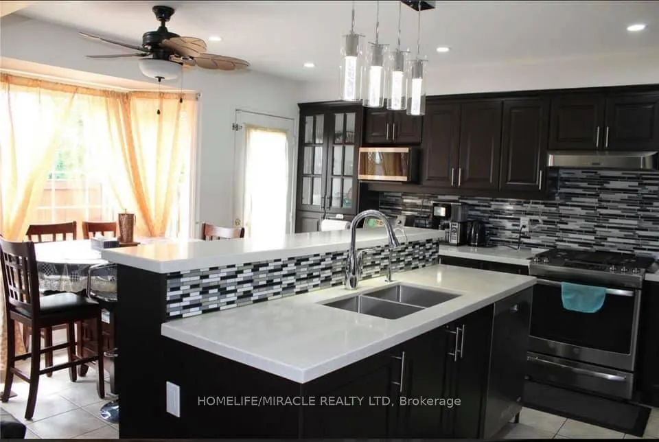 Photo 3 of Unit Main, 12 Worthington Avenue, Brampton, Fletcher's Meadow — HOMEH