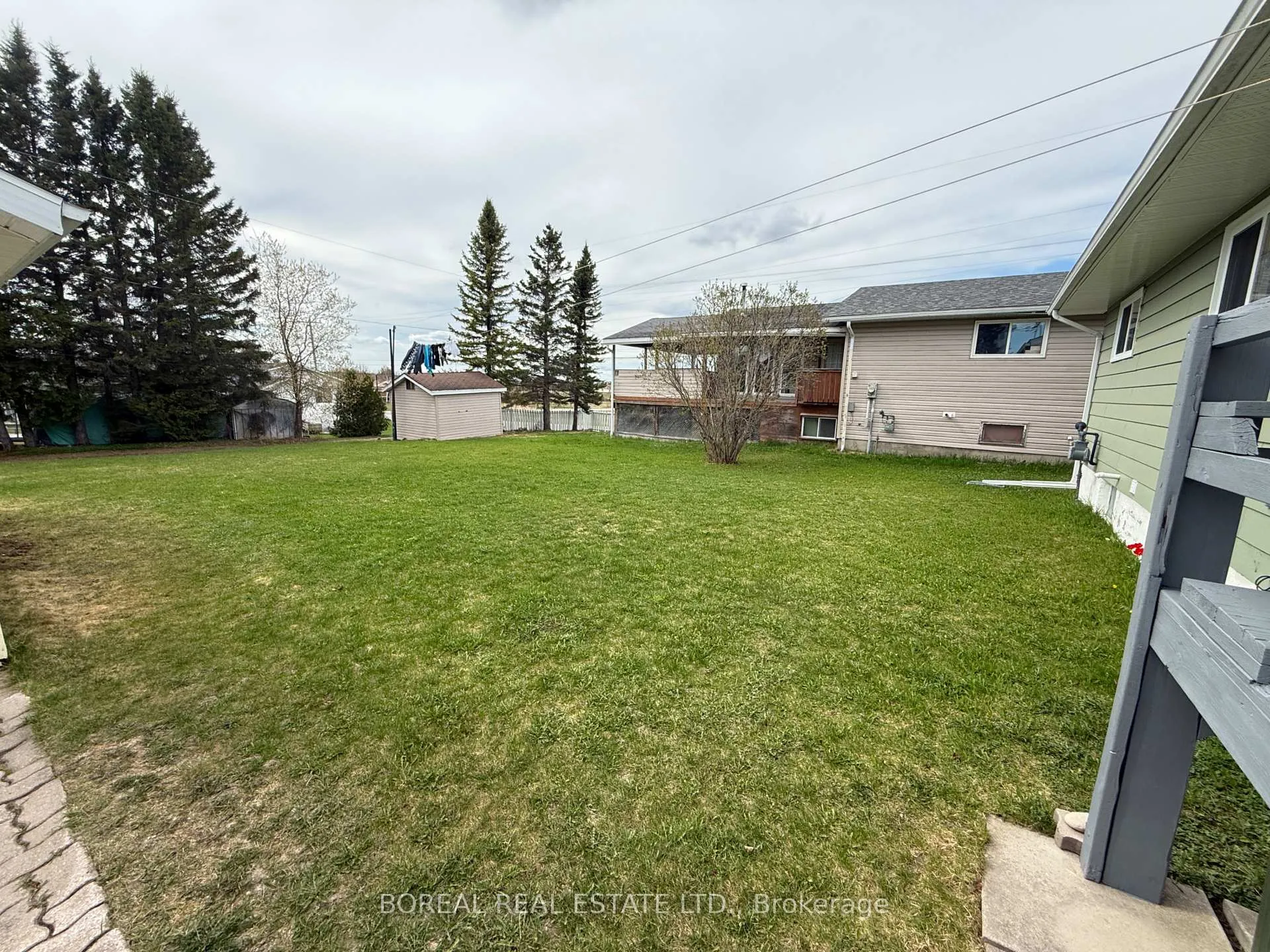 Photo 9 of 423 Fourteenth Avenue, Cochrane — HOMEH