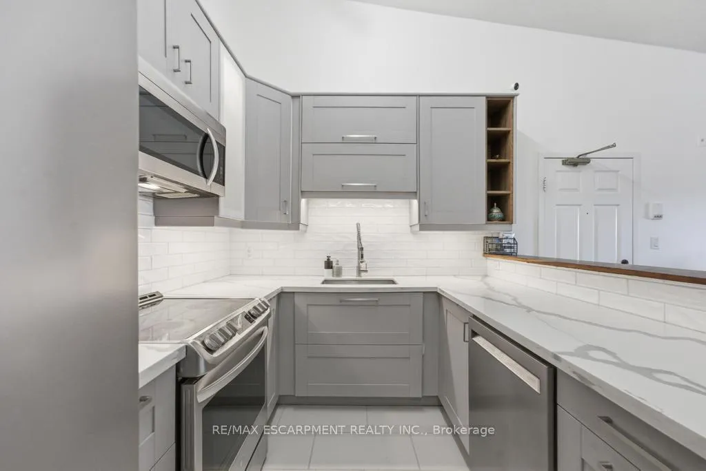 Photo 6 of Unit 410, 4013 Kilmer Drive, Burlington, Tansley — HOMEH