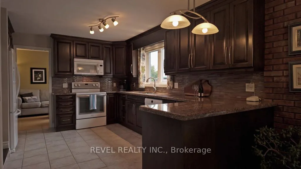 Photo 15 of 1089 Greeningdon Drive, Timmins, MTJ - Main Area — HOMEH