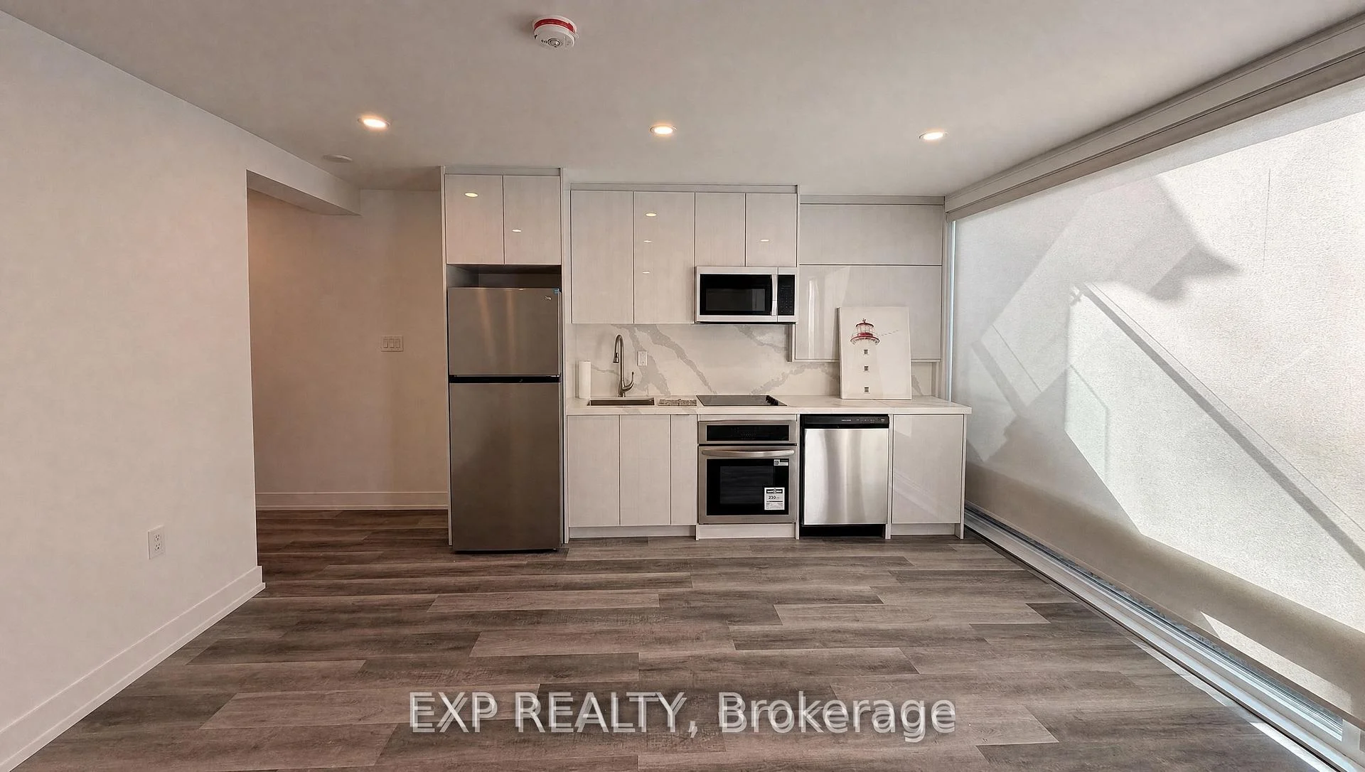 Photo 2 of Unit Lower, 19 Devon Road, Toronto, East End-Danforth — HOMEH
