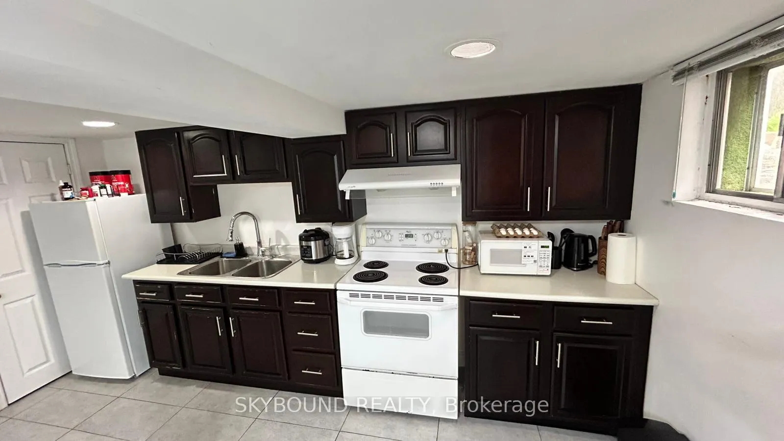 Photo 2 of Unit Lower, 8 Runnymede Road, Toronto, High Park-Swansea — HOMEH