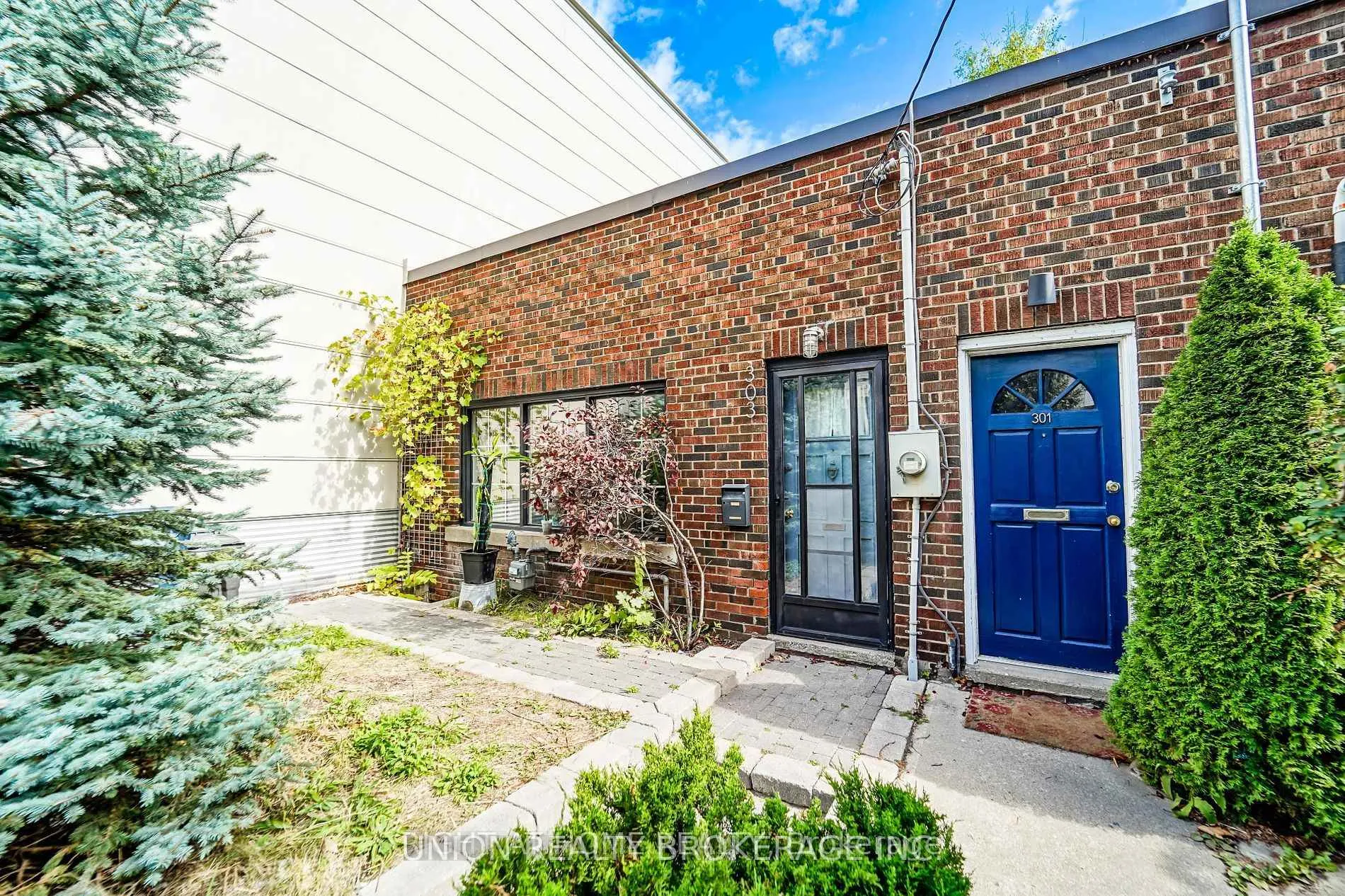 Front of 303 Coxwell Avenue