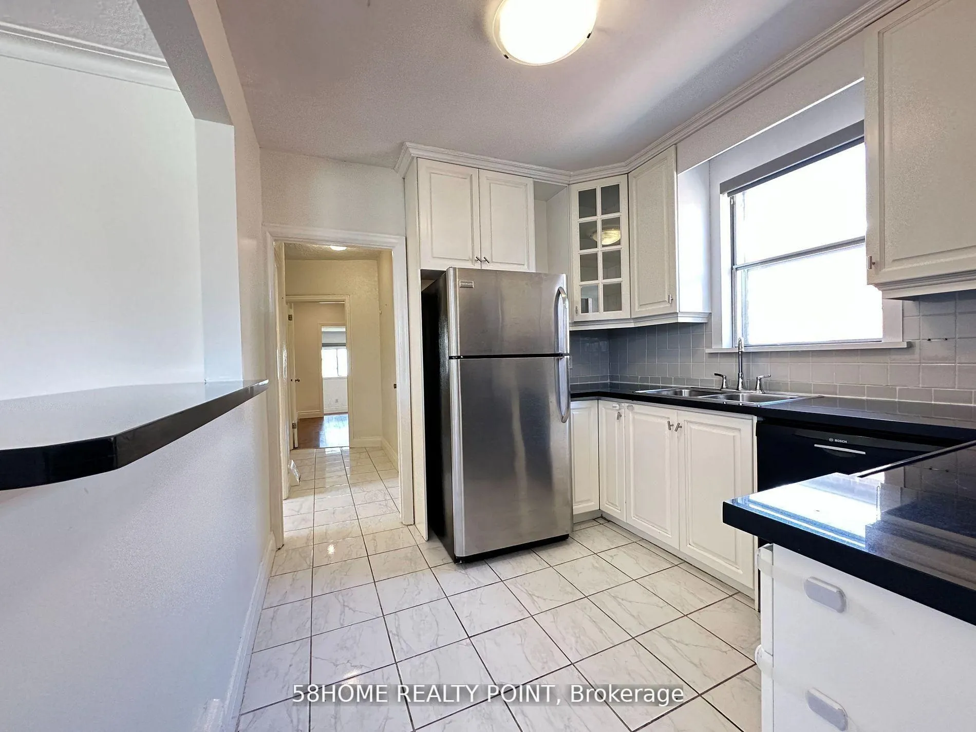Photo 5 of Unit Main, 56 Regina Avenue, Toronto, Englemount-Lawrence — HOMEH