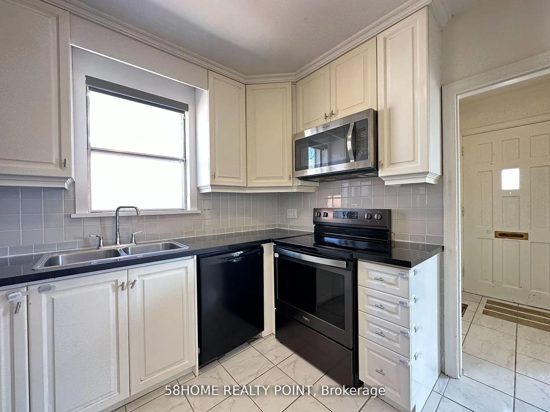 Photo 6 of Unit Main, 56 Regina Avenue, Toronto, Englemount-Lawrence — HOMEH