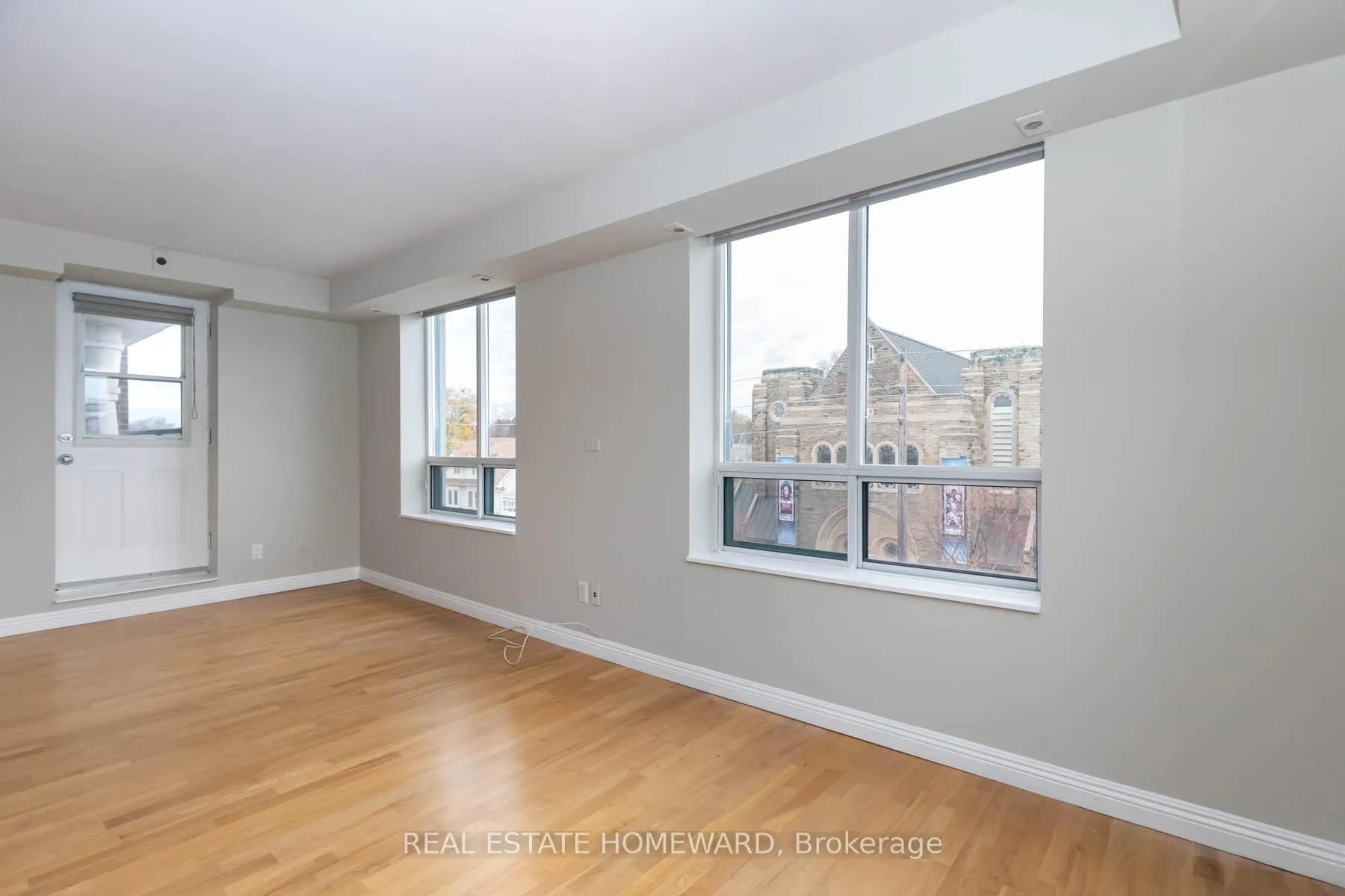 Photo 4 of Unit 413, 1765 Queen Street E, Toronto, The Beaches — HOMEH