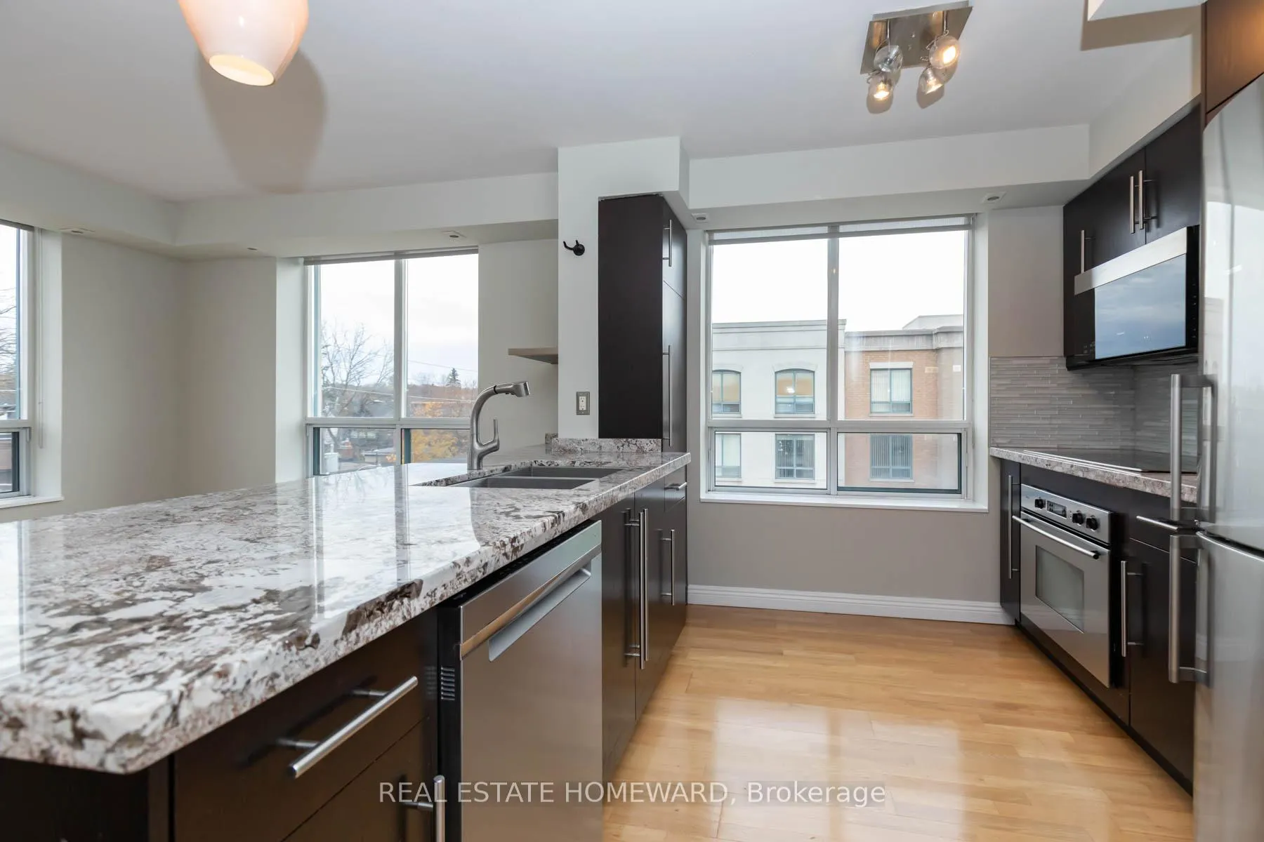 Photo 6 of Unit 413, 1765 Queen Street E, Toronto, The Beaches — HOMEH