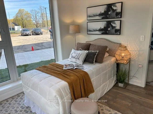 Photo 14 of Unit 410, 1687 Highway 2 Road, Clarington, Courtice — HOMEH