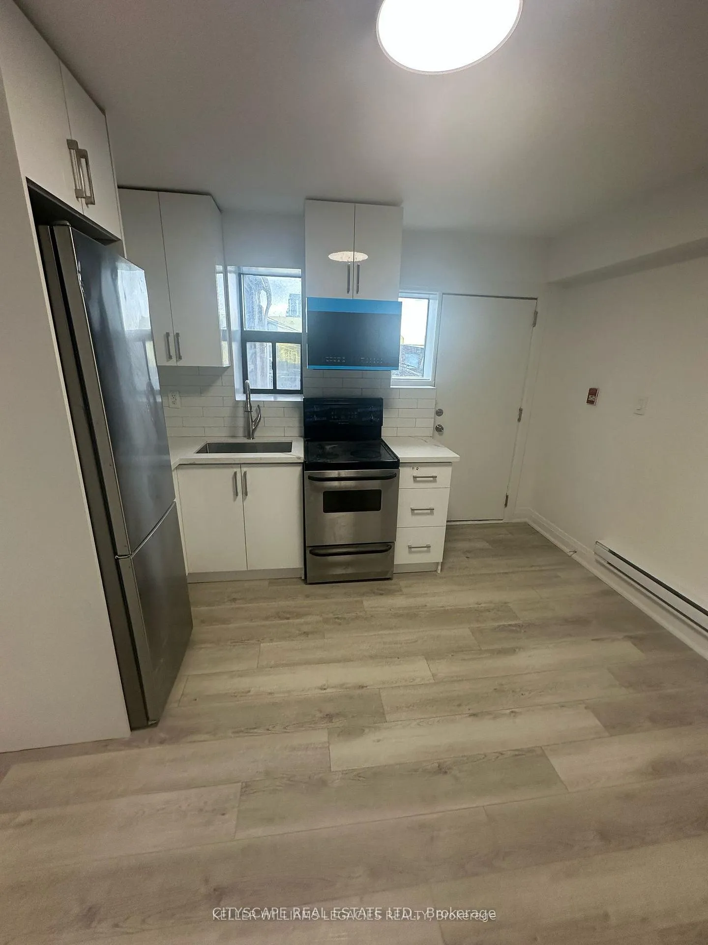 Photo 2 of Unit Unit 2, 1710 St Clair Avenue W, Toronto, Weston-Pellam Park — HOMEH