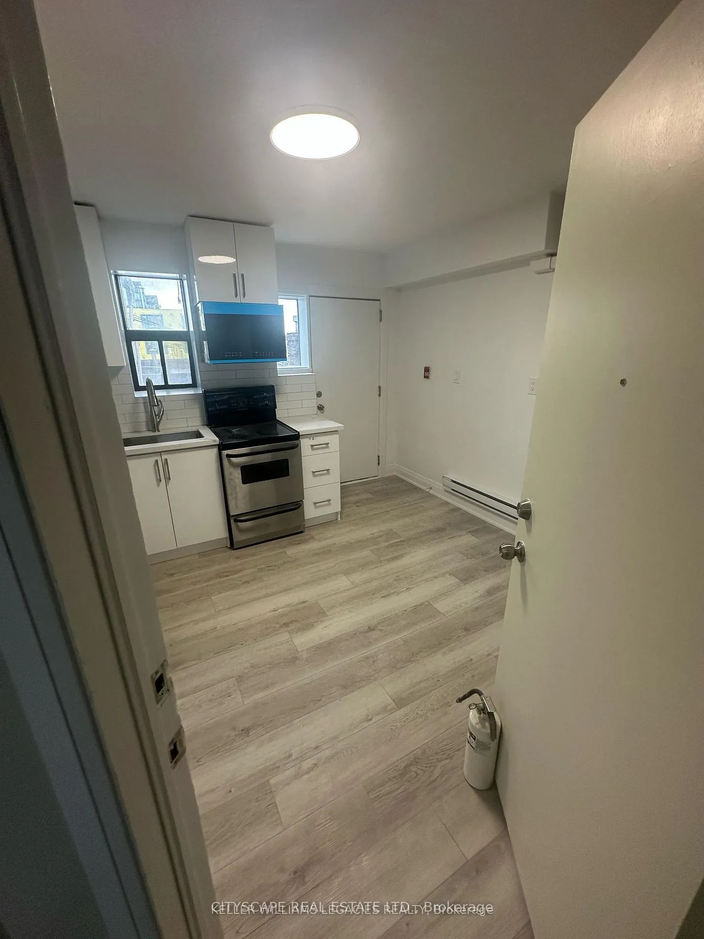 Photo 3 of Unit Unit 2, 1710 St Clair Avenue W, Toronto, Weston-Pellam Park — HOMEH