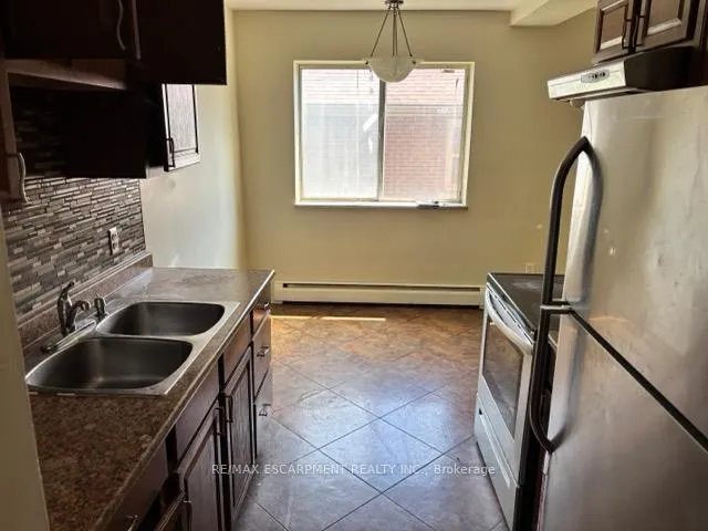 Photo 3 of Unit 1, 2205 King Street E, Hamilton, Glenview — HOMEH