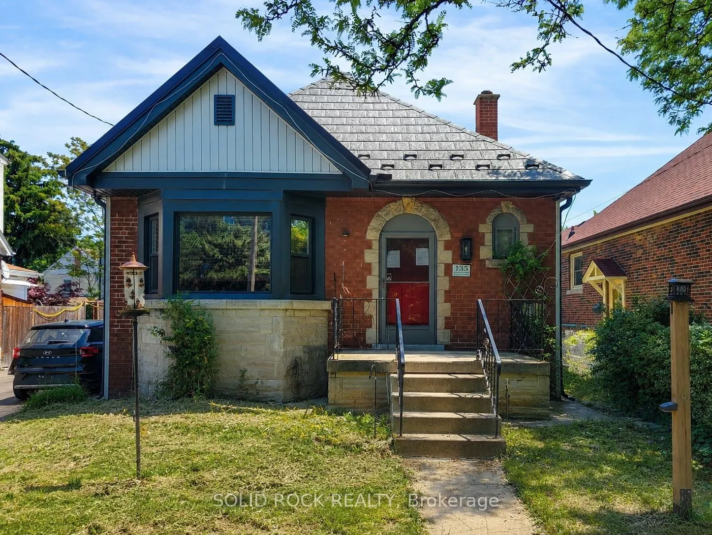 Front of 135 Wexford Avenue S