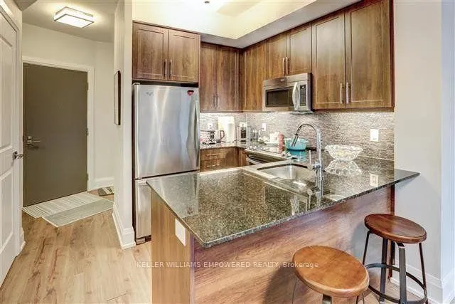 Photo 10 of Unit 402, 1 Old Mill Drive, Toronto, High Park-Swansea — HOMEH