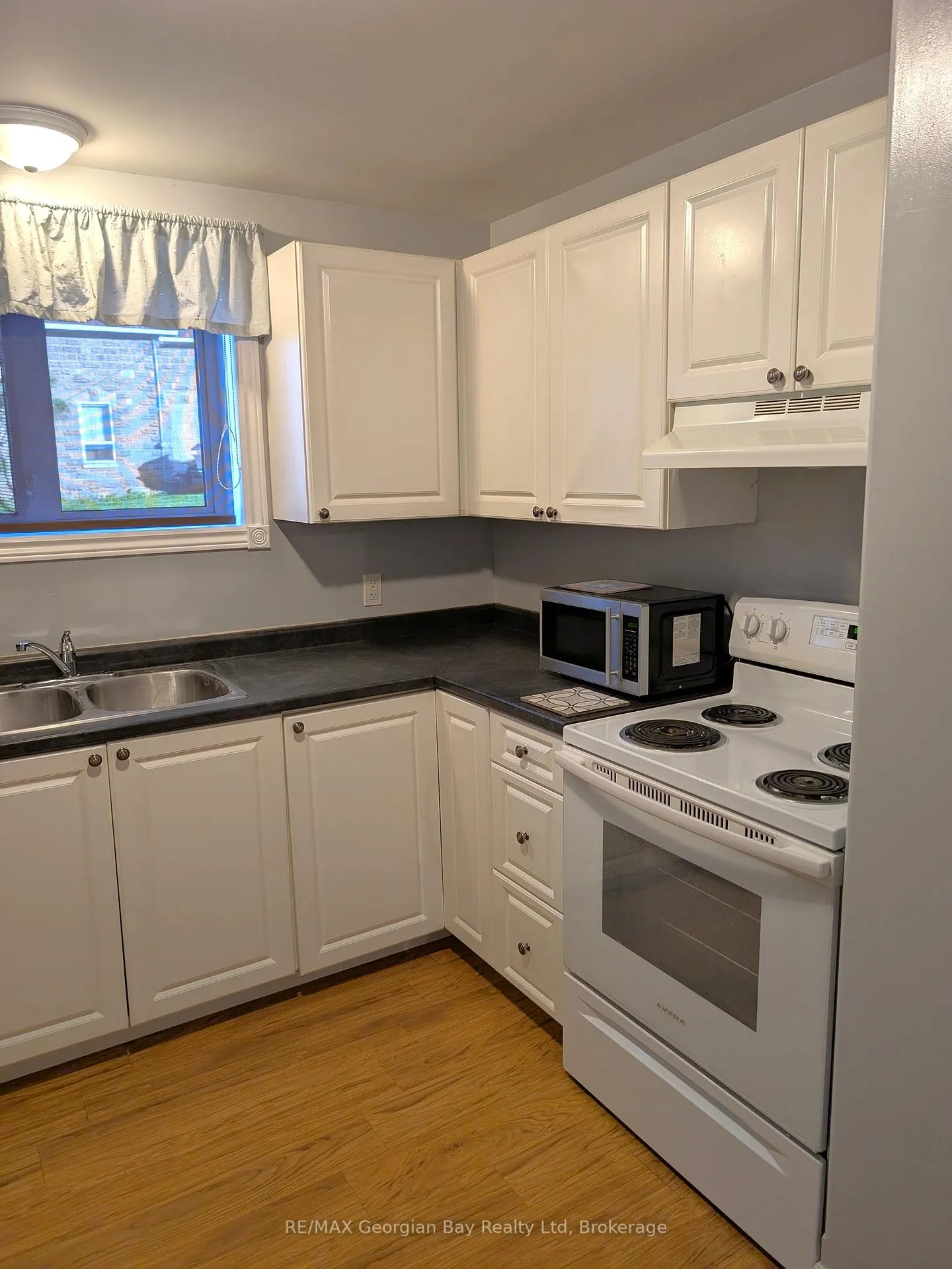Photo 2 of Unit Basement, 144 Fourth Street, Midland — HOMEH