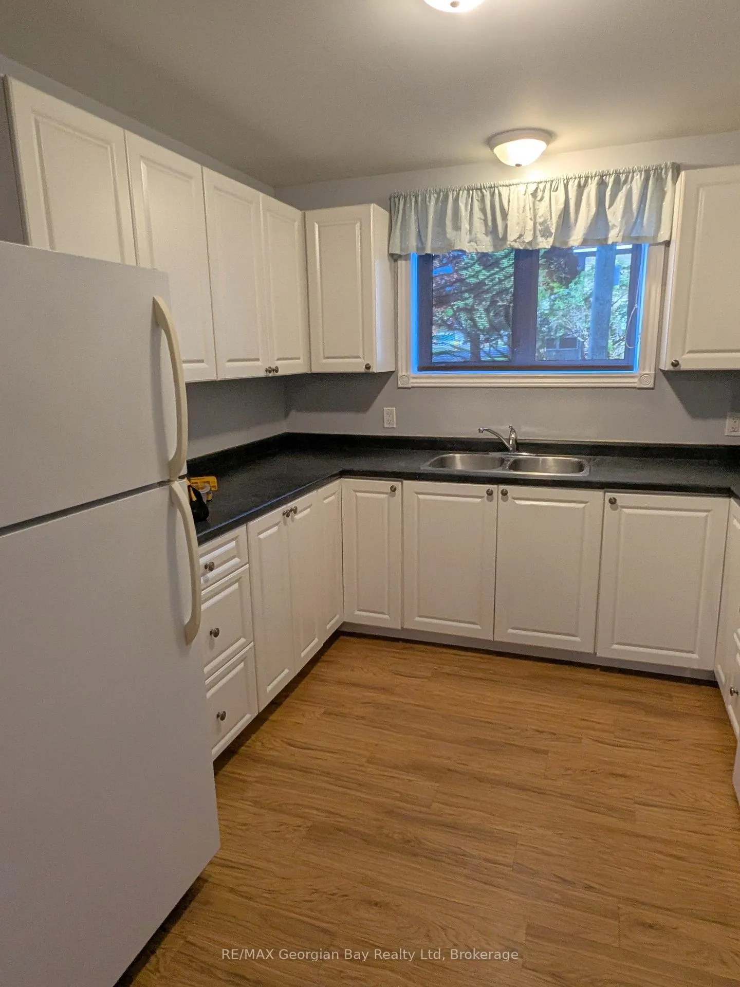 Photo 3 of Unit Basement, 144 Fourth Street, Midland — HOMEH