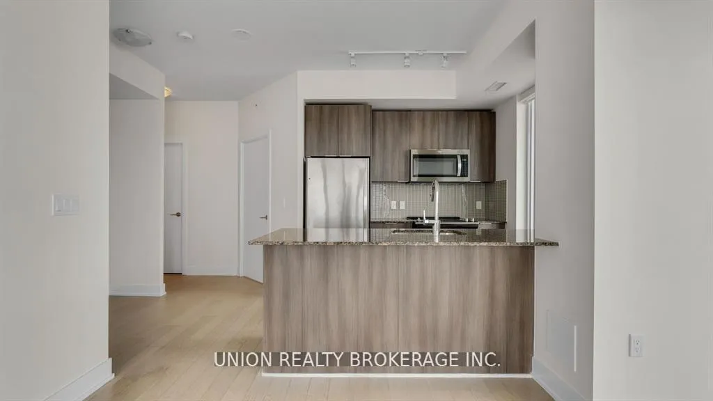 Photo 12 of Unit 3907, 20 Shore Breeze Drive, Etobicoke, Mimico — HOMEH