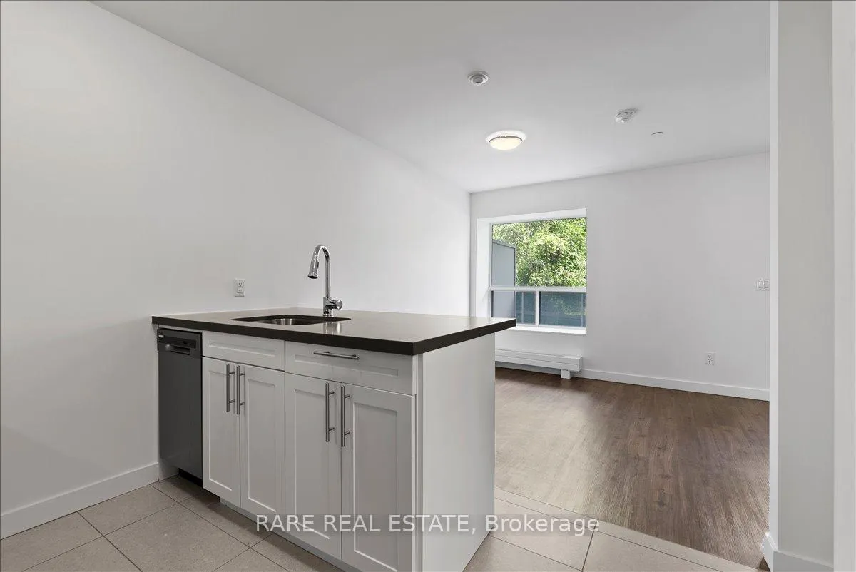 Photo 3 of Unit 106, 10 Garfella Drive, Etobicoke, West Humber-Clairville — HOMEH
