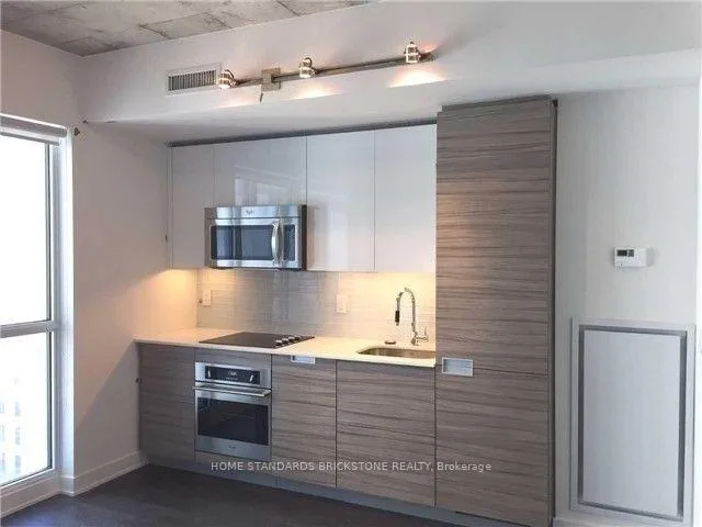 Photo 2 of Unit 603, 210 Simcoe Street, Toronto, University — HOMEH