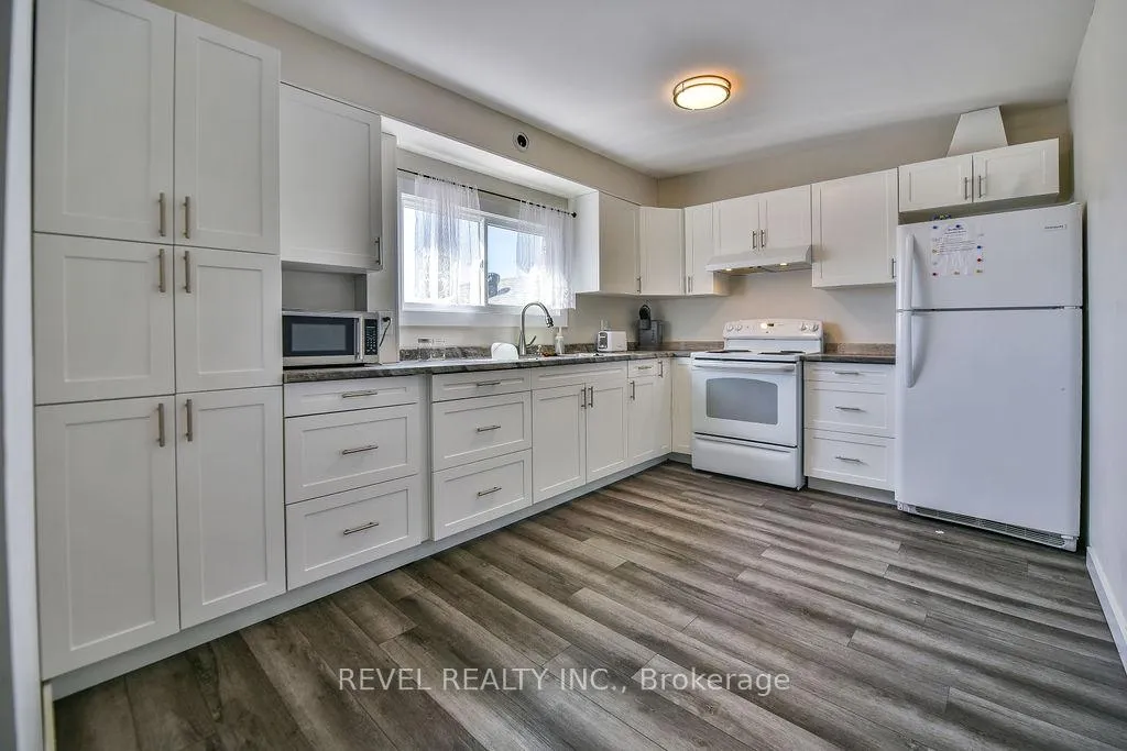 Photo 6 of 223 Cedar Street N, Timmins, TNE - Central — HOMEH