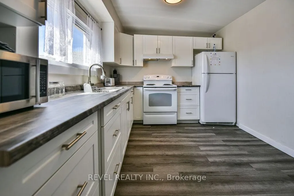 Photo 8 of 223 Cedar Street N, Timmins, TNE - Central — HOMEH