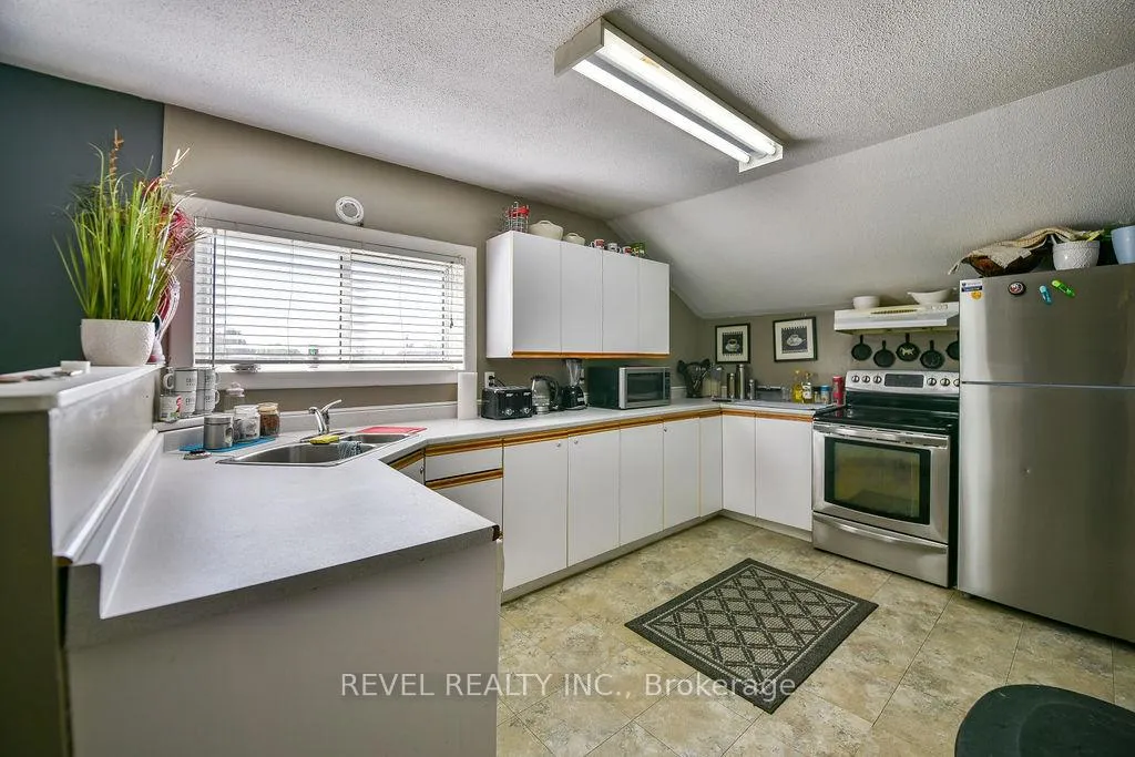 Photo 20 of 223 Cedar Street N, Timmins, TNE - Central — HOMEH
