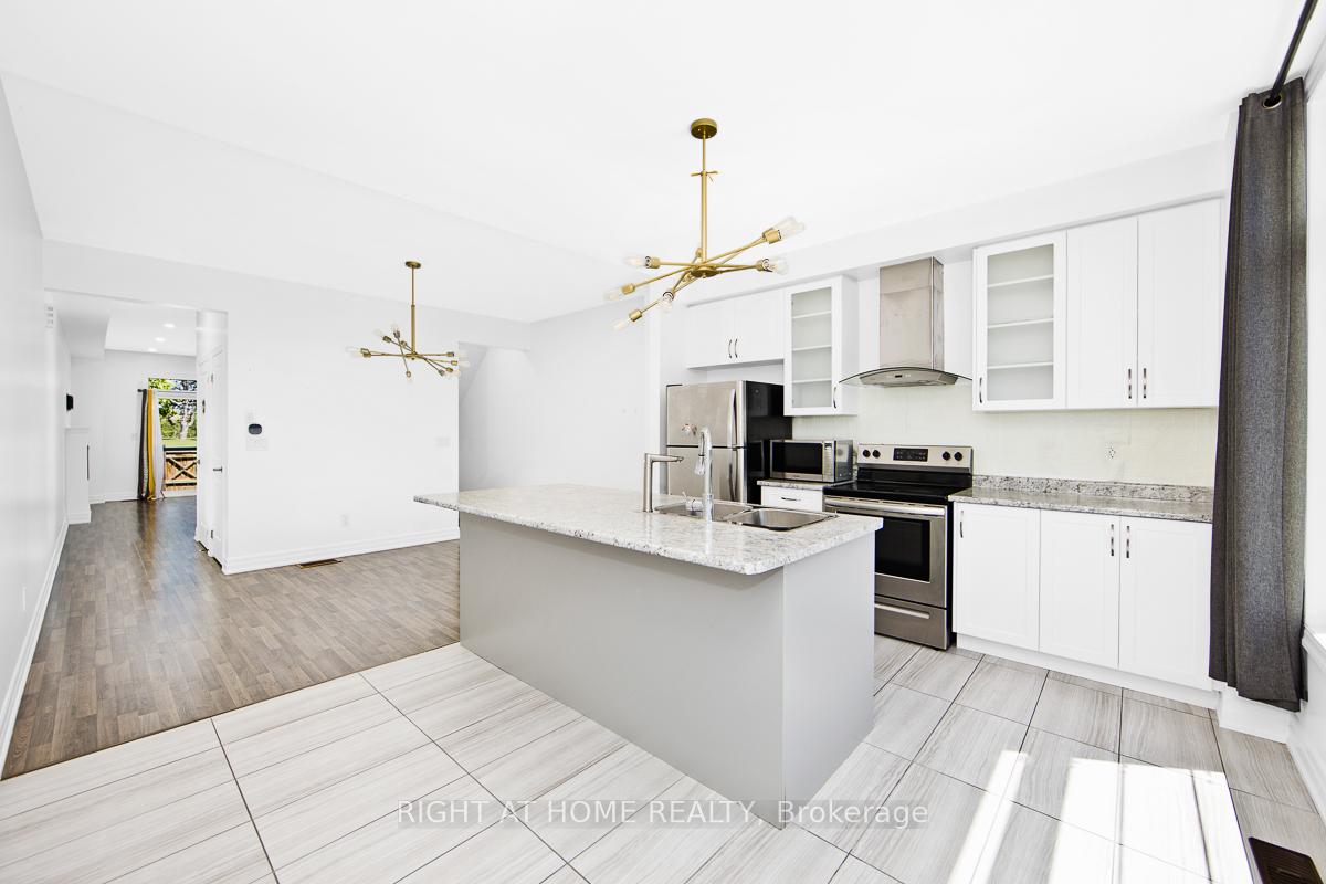 Photo 13 of Unit 34, 384 Arctic Red Drive E, Oshawa, Windfields — HOMEH