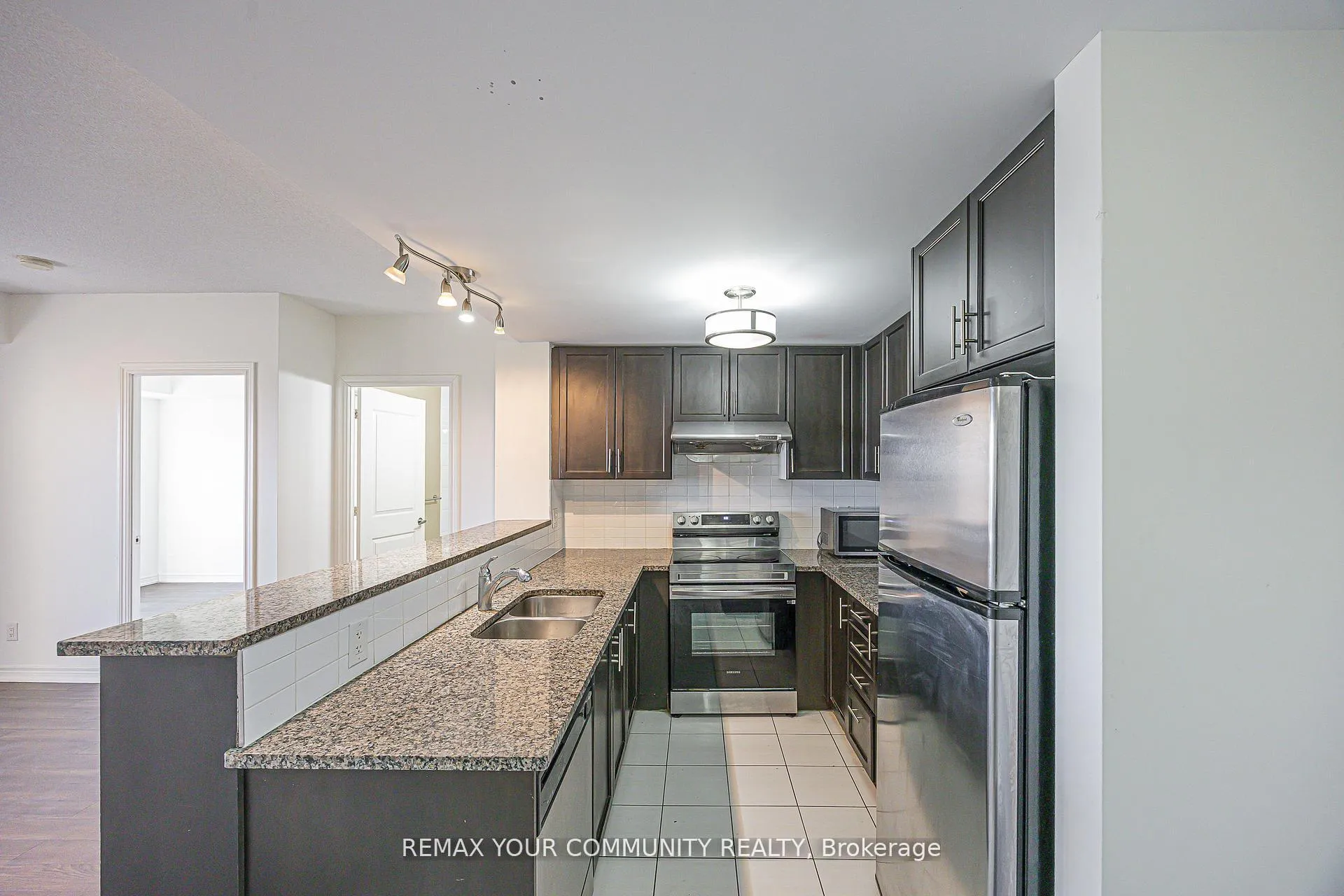 Photo 10 of Unit 1007, 9245 Jane Street, Vaughan, Maple — HOMEH