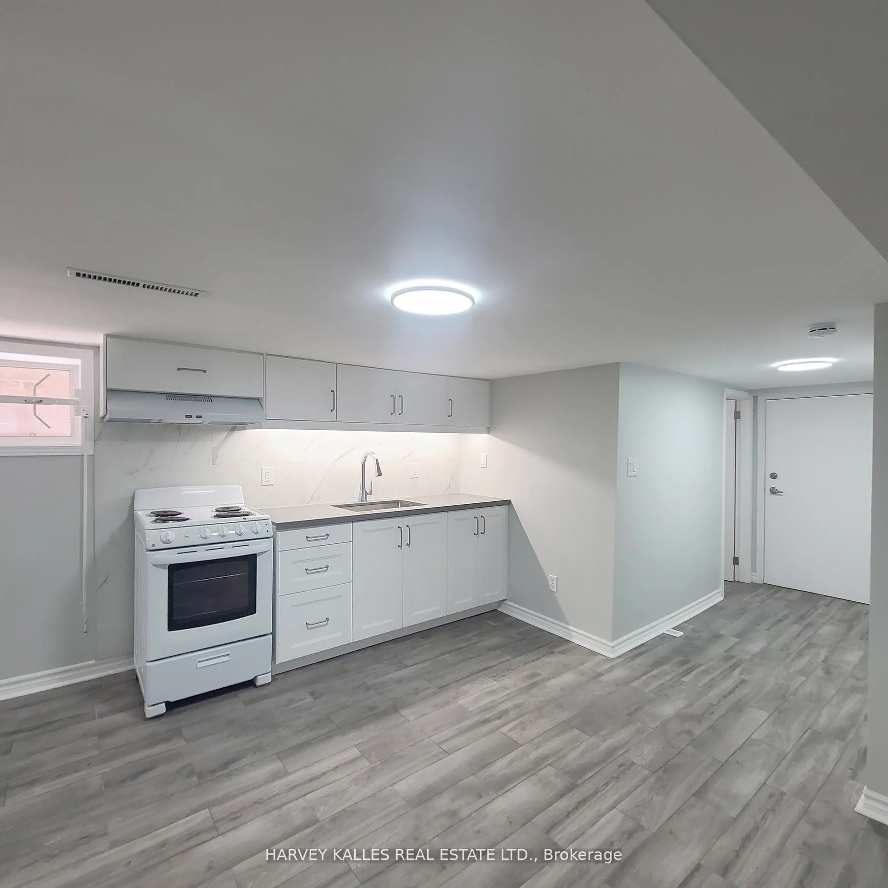 Photo 5 of Unit Lower, 238 Strathmore Boulevard, Toronto, Danforth — HOMEH