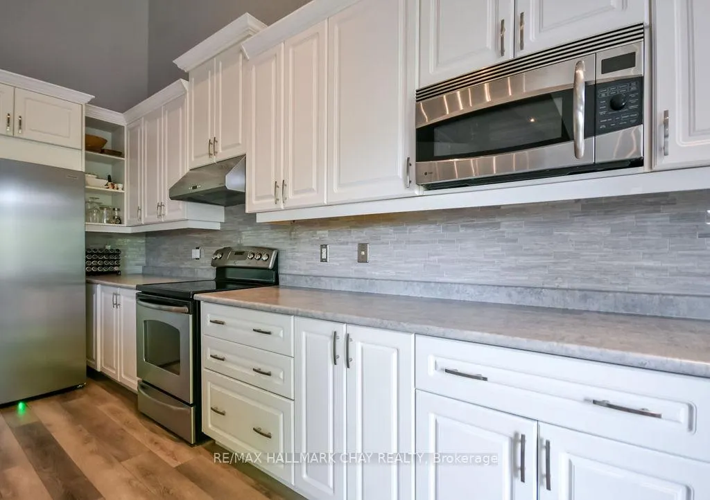 Photo 11 of 34 Meadowood Drive, Wasaga Beach — HOMEH