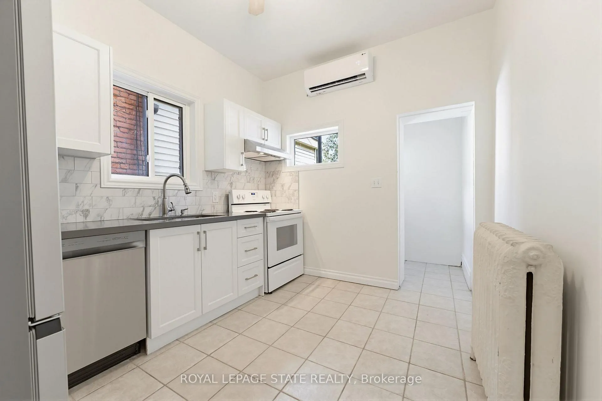 Photo 10 of Unit 1, 25 Strathcona Avenue S, Hamilton, Strathcona — HOMEH