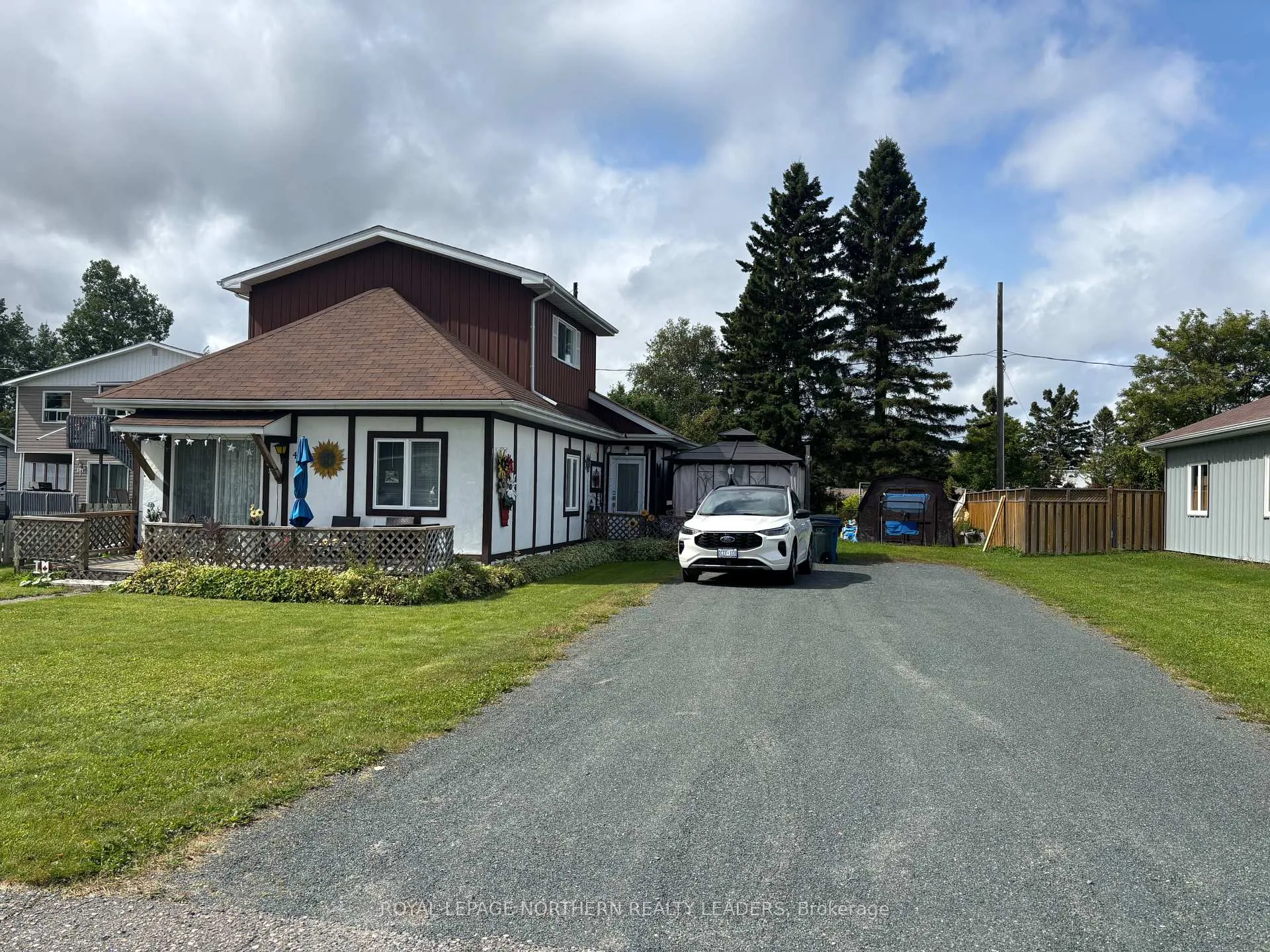 Photo 1 of 411 Tenth Avenue, Cochrane — HOMEH