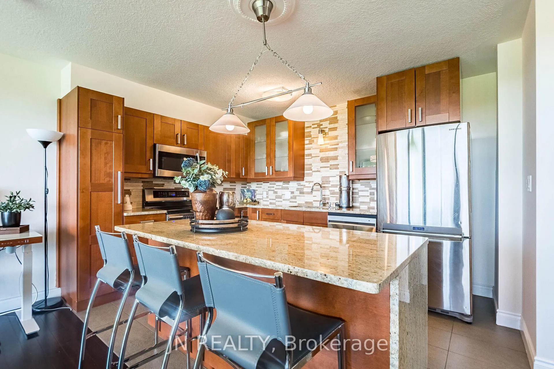 Photo 1 of Unit 409, 188 Mill Street S, Brampton, Brampton South — HOMEH