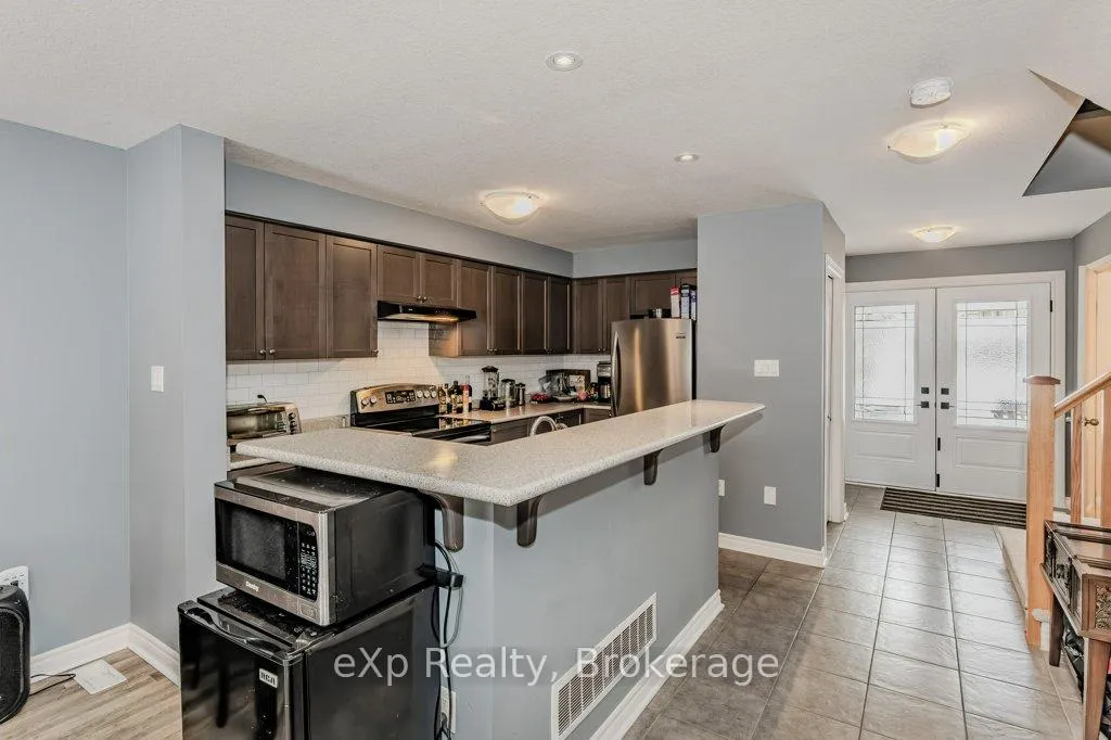 Photo 11 of 55 Laughland Lane, Guelph, Pineridge/Westminster Woods — HOMEH