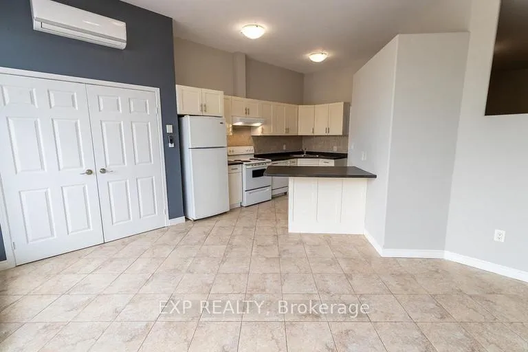Photo 3 of Unit 102, 40 Front Street N, Thorold, Thorold Downtown — HOMEH