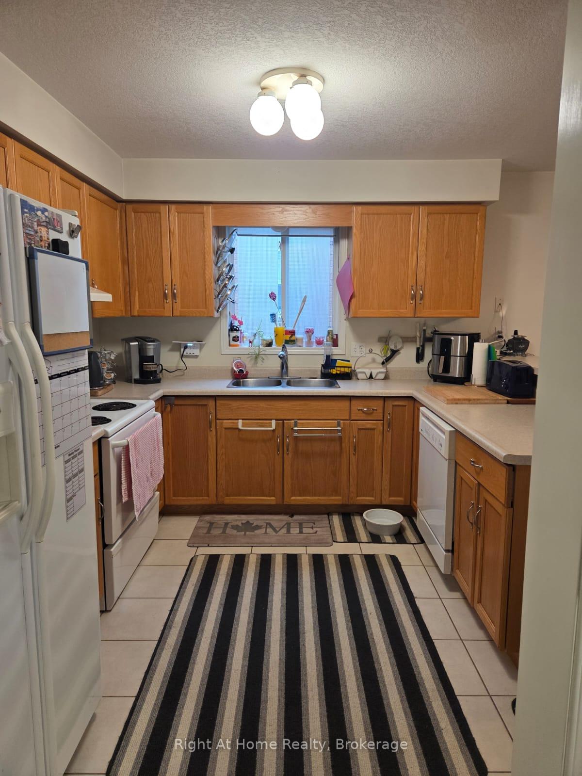 Photo 9 of 21 Fuller Drive, Guelph, Grange Road — HOMEH