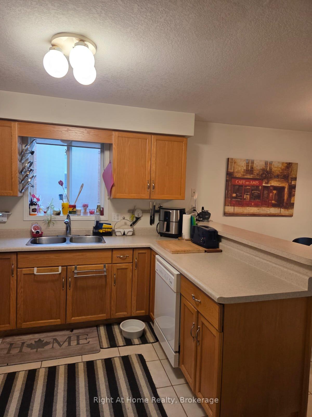 Photo 10 of 21 Fuller Drive, Guelph, Grange Road — HOMEH