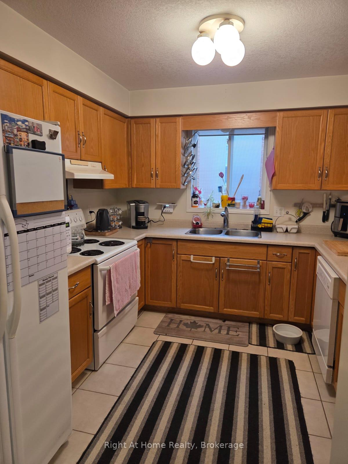 Photo 11 of 21 Fuller Drive, Guelph, Grange Road — HOMEH