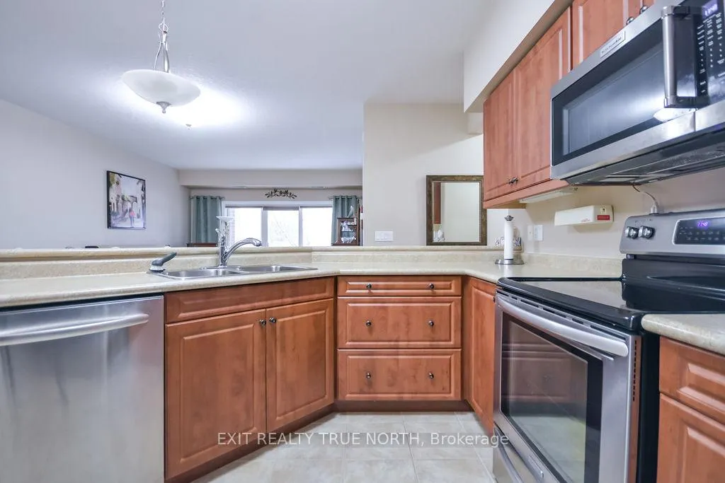 Photo 11 of Unit 204, 19B Yonge Street N, Springwater, Elmvale — HOMEH