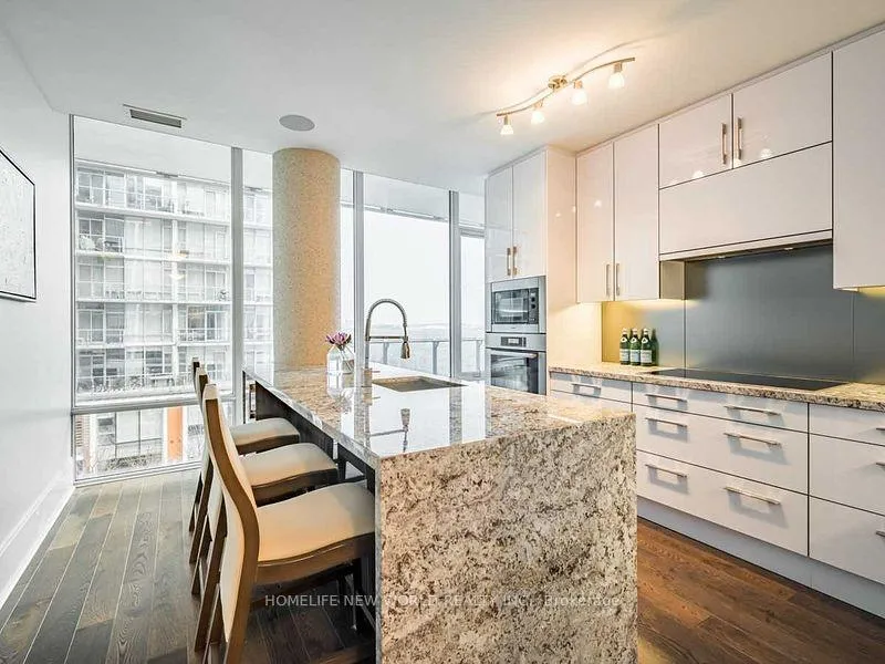 Photo 2 of Unit 406, 29 Queens Quay E, Toronto, Waterfront Communities — HOMEH
